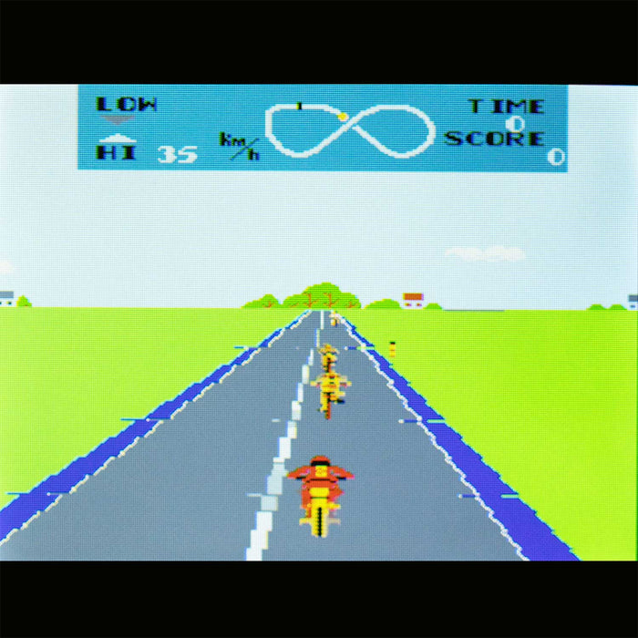 Playing bike racing game in Orb - Retro Mini Arcade Machine (240-in-1 Games)