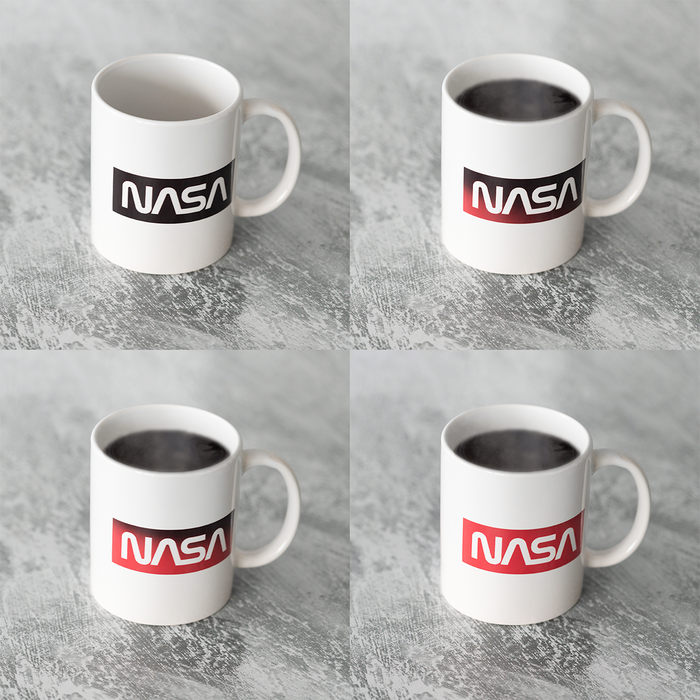 NASA Colour Changing Mug showing different heat reactive designs on a textured surface.