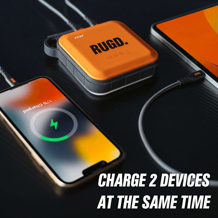 RUGD Power Brick charging two devices simultaneously, showcasing fast and convenient outdoor power solutions.