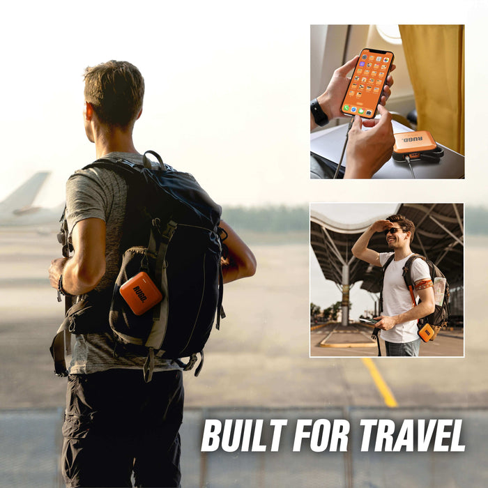 Traveler using the Ultimate Travel Bundle with Power Brick, showcasing portability and convenience for outdoor adventures.