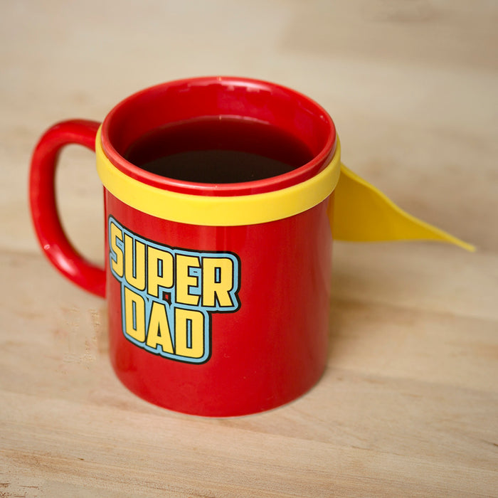 Bright red Super Dad Mug with yellow cape and bold lettering, perfect for coffee or tea.