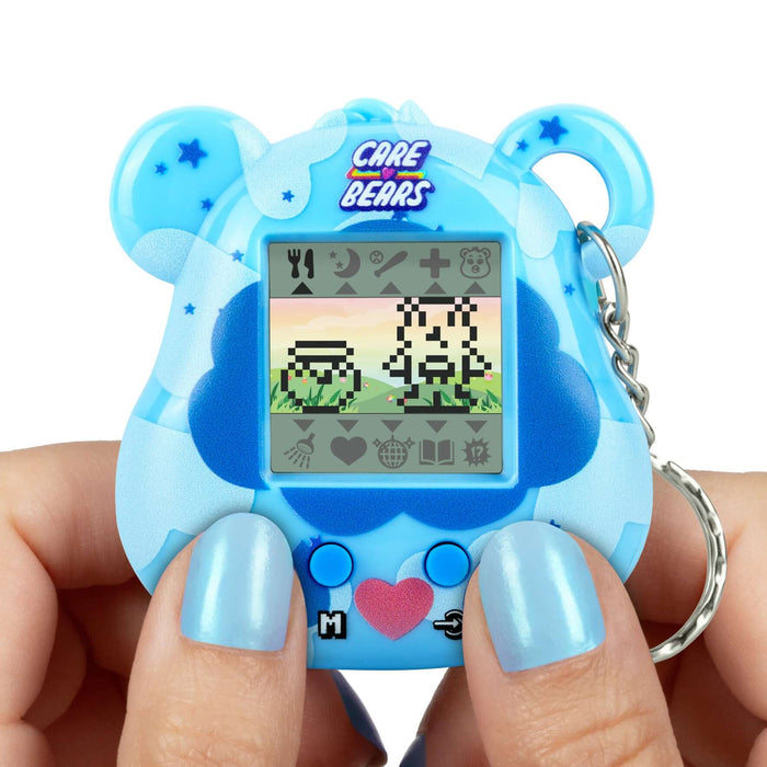 Blue Care Bears Digital Pet device showing pixel animations for interactive gameplay and care features.
