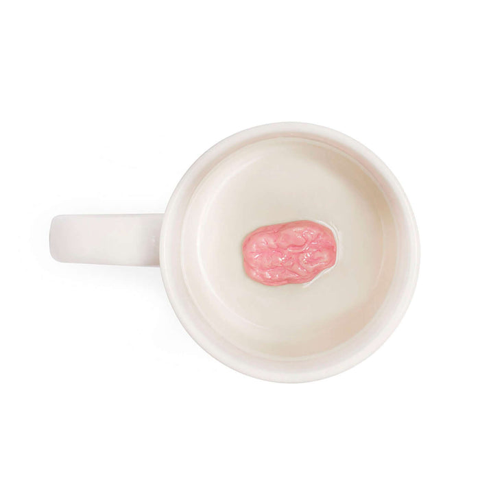 Chewing Gum 'Prank' Mug with hidden pink gumball at the bottom, perfect for surprise sipping.