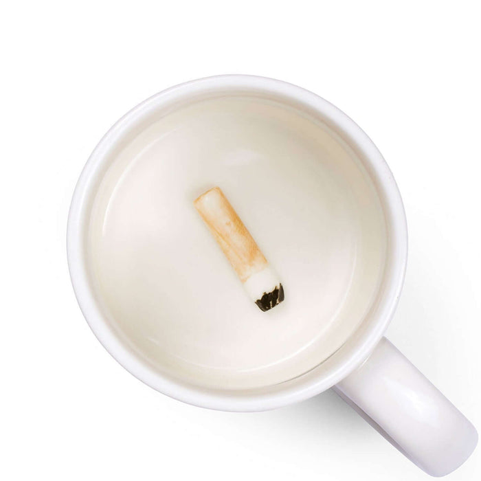 Top view of the Cigarette 'Prank' Mug revealing a hidden cigarette design at the bottom.