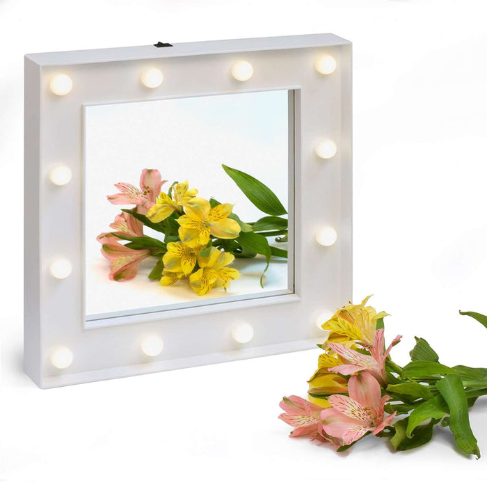 Hollywood Mirror with LED bulbs reflecting colorful flowers on a white background, perfect for makeup lovers.