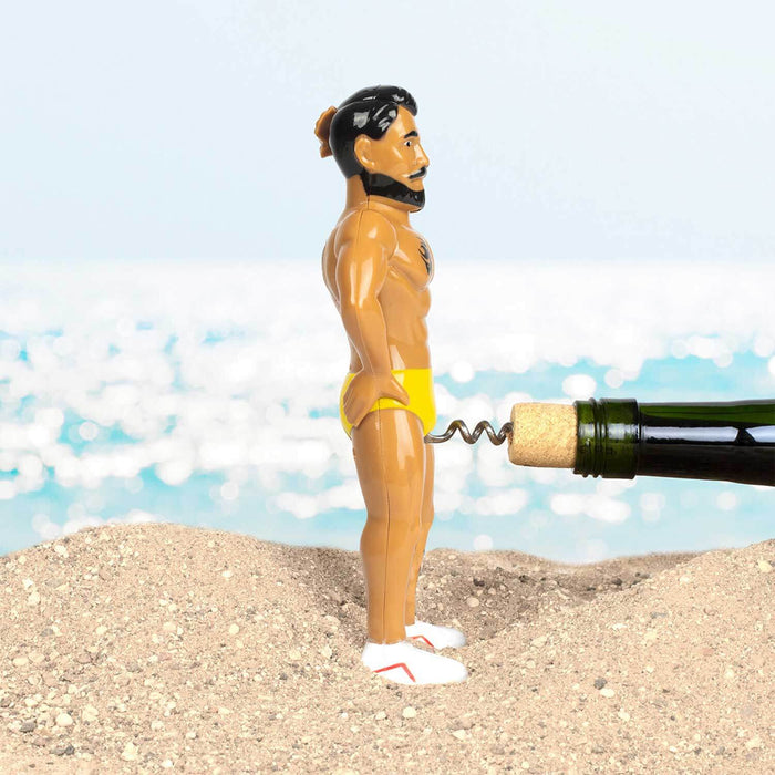 "Mr. Lovin' Cork Screw on sandy beach opening wine bottle, showcasing fun and stylish wine accessory design."