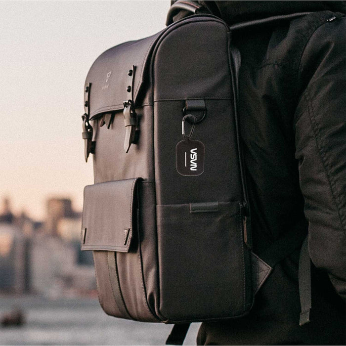 Stylish black NASA backpack with logo, designed for urban explorers and space enthusiasts.