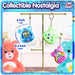 Collectible Care Bears Digital Pets displayed on a stand, showcasing Grumpy Bear and features like size details.