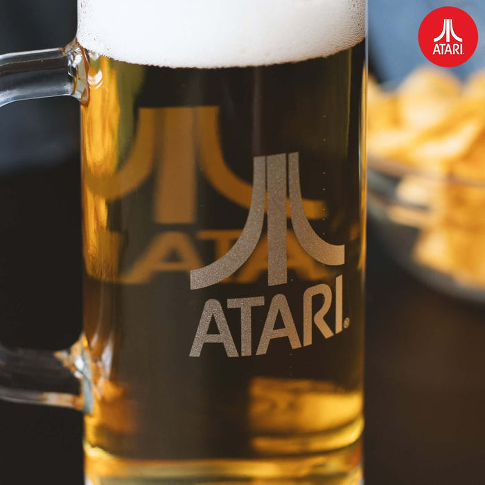 Official Atari Beer Glass - 1 Pint / 600ml, featuring iconic Atari emblem, filled with beer, showcasing detailed 3D design.