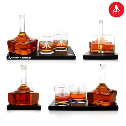 Official Atari CX-10 Controller Decanter Set with 2 Action Button Whisky Glasses and Games Pad Tray featuring "Futuristic Since Forever" slogan.