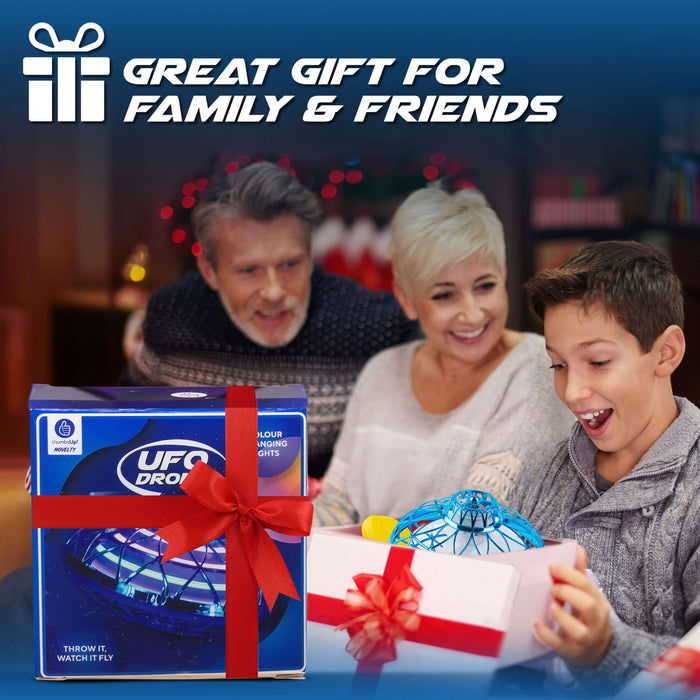 Family enjoying the UFO Drone as a great gift, with a child excitedly unboxing it during a festive gathering.