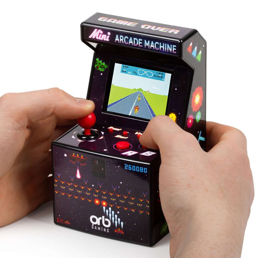 Hands playing the Orb Retro Mini Arcade Machine with vibrant screen showcasing a classic game.