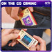 Person holding an Orb retro handheld games console, showcasing 8-bit graphics and portable design for on-the-go gaming.
