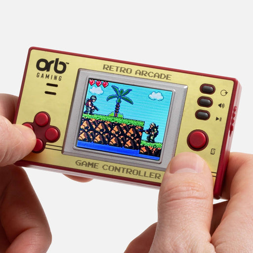 Person holding the Orb Retro Mini Handheld Games Console showcasing vibrant 8-bit graphics on a colour screen.