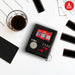 Atari handheld console gaming keyring with 2" LCD screen, featuring iconic games like Pong, Asteroids, and Missile Command.