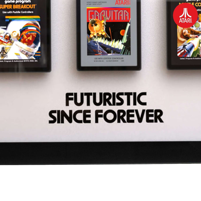 Official Atari 3D Wall Art - Cartridge Collection showcasing retro game cartridges with "Futuristic Since Forever" text.