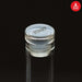 Atari decanter set stopper with engraved Atari logo on a clear luxury bottle top.