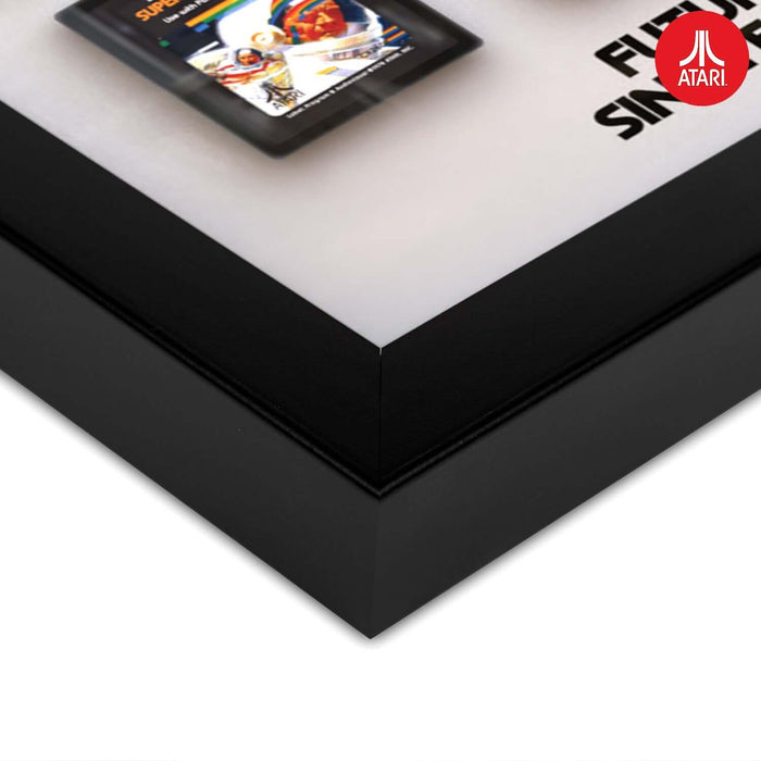 Close-up of Official Atari 3D Wall Art - Cartridge Collection, showcasing vibrant retro designs in a sleek black frame.