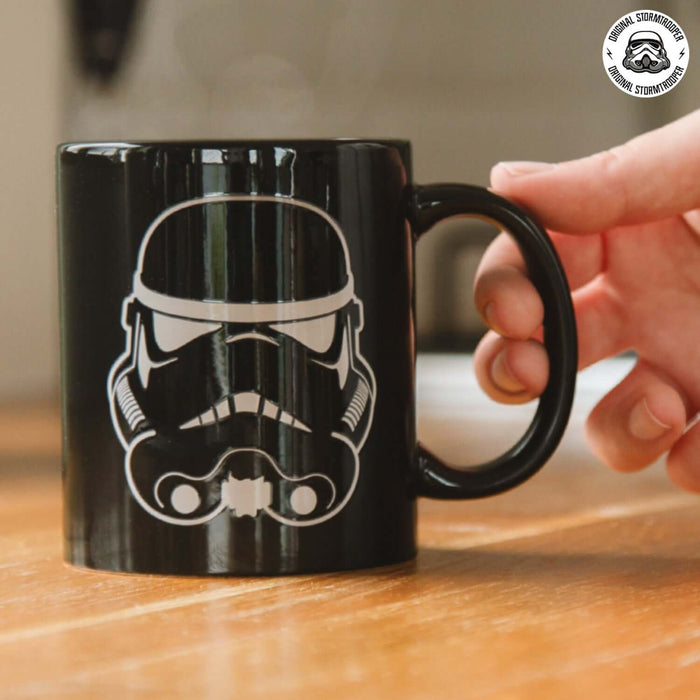 Original Stormtrooper Colour Changing Mug in hand, showcasing iconic design, perfect for hot beverages and Star Wars fans.