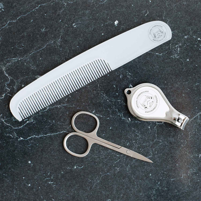 Original Stormtrooper Grooming Set tools: comb, grooming scissors, and nail clippers on a dark surface.