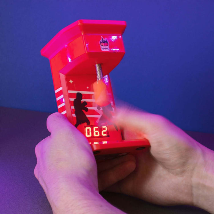 Retro Mini Punch Bag Game Machine with digital score display in action, showcasing finger-flicking arcade boxing gameplay.