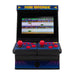 Retro Mini Arcade Machine with screen displaying a classic 8-bit game, equipped with dual red joysticks and buttons, ideal for two-player gaming.